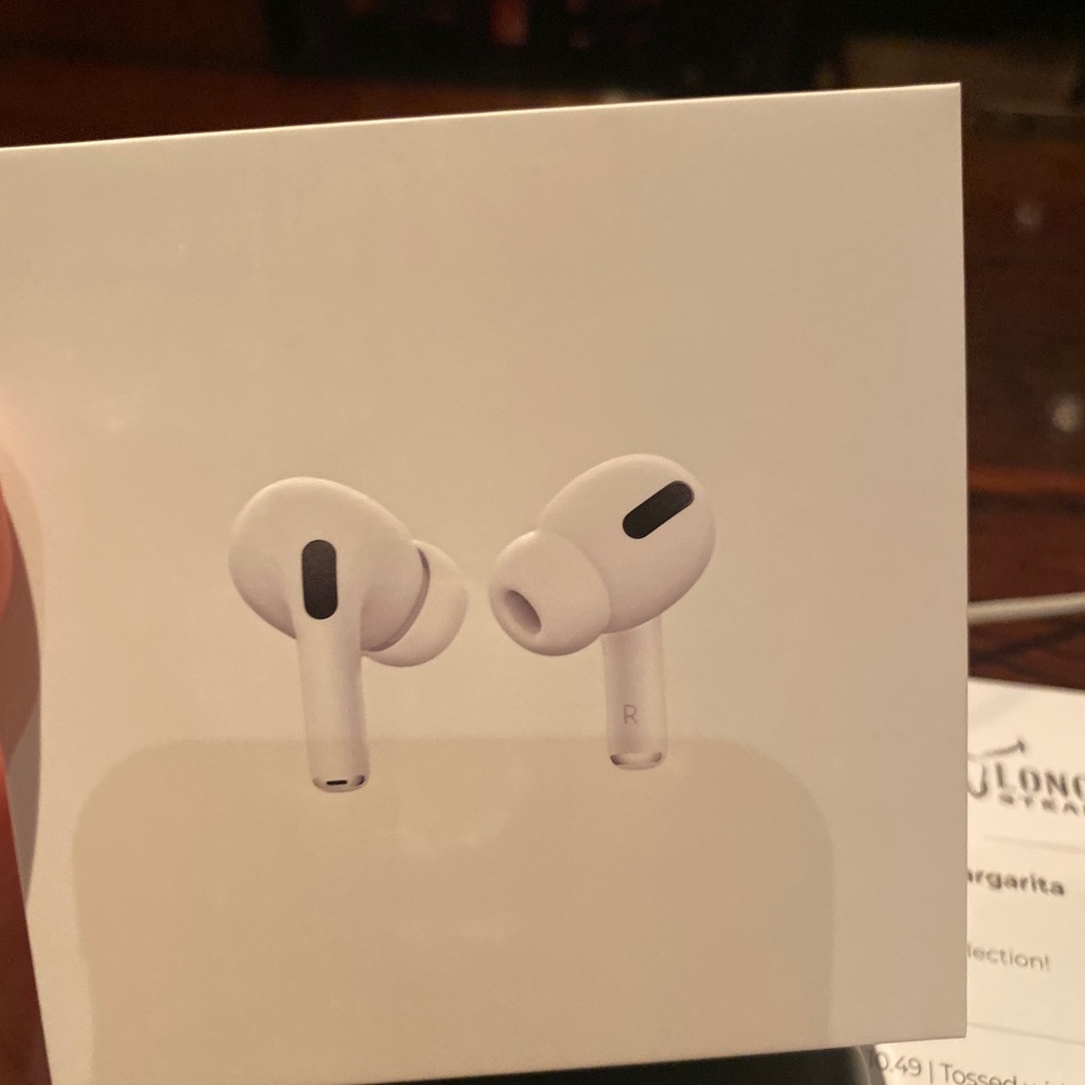 brand new real apple air pod pro in white.